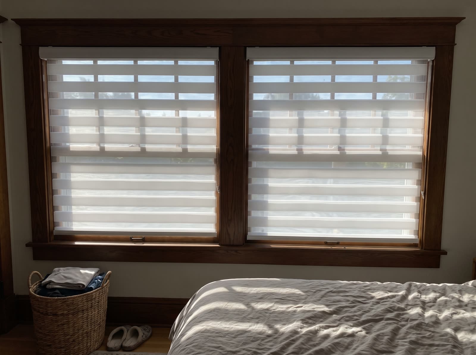 White zebra shade closed for privacy in a Roswell bedroom