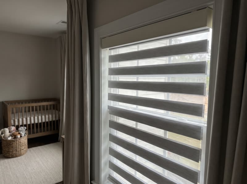 Zebra shade on a nursery window in a new build in a modern subdivision in Suwanee