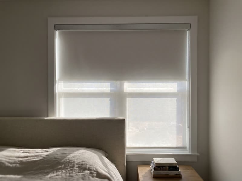 Dual shade on a primary bedroom window in a new build in a modern subdivision in Cumming