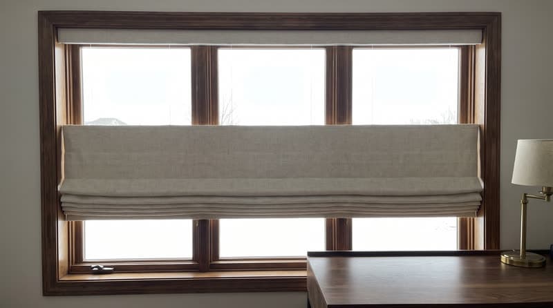 Roman shade on a home office window in a traditional two-storey house in Johns Creek