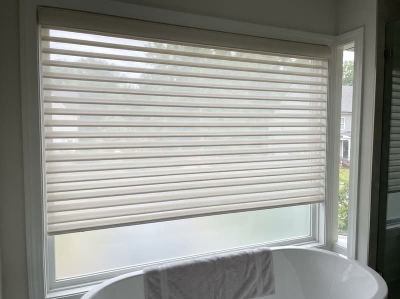 Shangri-La sheer shade on a bathroom window in a new build in a modern subdivision in Sandy Springs