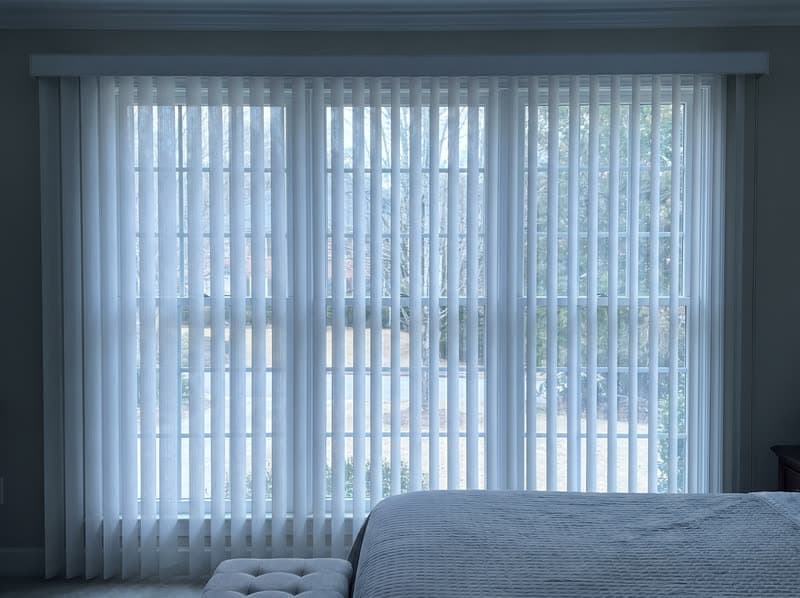 Dream curtain vertical sheer on a guest bedroom window in a 1990s brick colonial in Woodstock